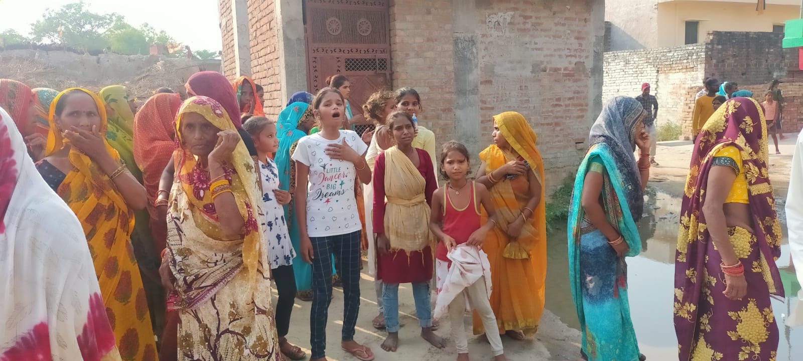 Locals at Barajetha village mourn the death of 12 people Killed in Shahjahanpur Accident in Uttar Pradesh, on Sunday May 26, 2024