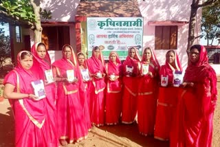 KHANDWA 500 WOMEN CULTIVATING HERBS