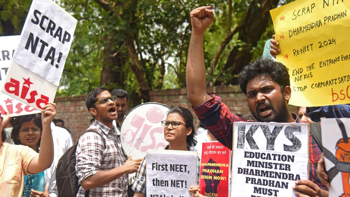 AISA supporters protest against the alleged NEET scam at Jantar Mantar in New Delhi on Thursday.