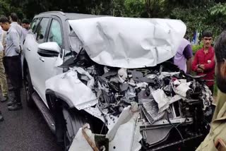 A new Fortuner car hit the standing bus from back side in Udupi