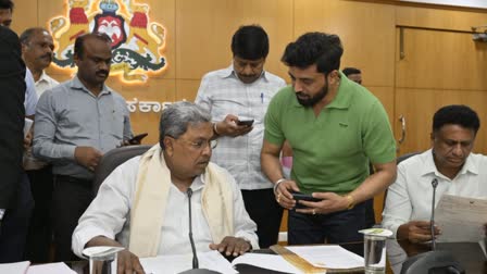 Anirudh Jatkar with CM Siddaramaiah