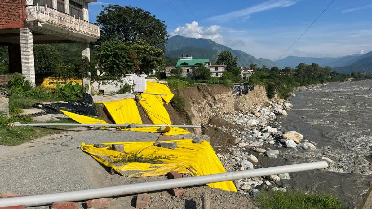 Road flowed into Beas River in Kullu.