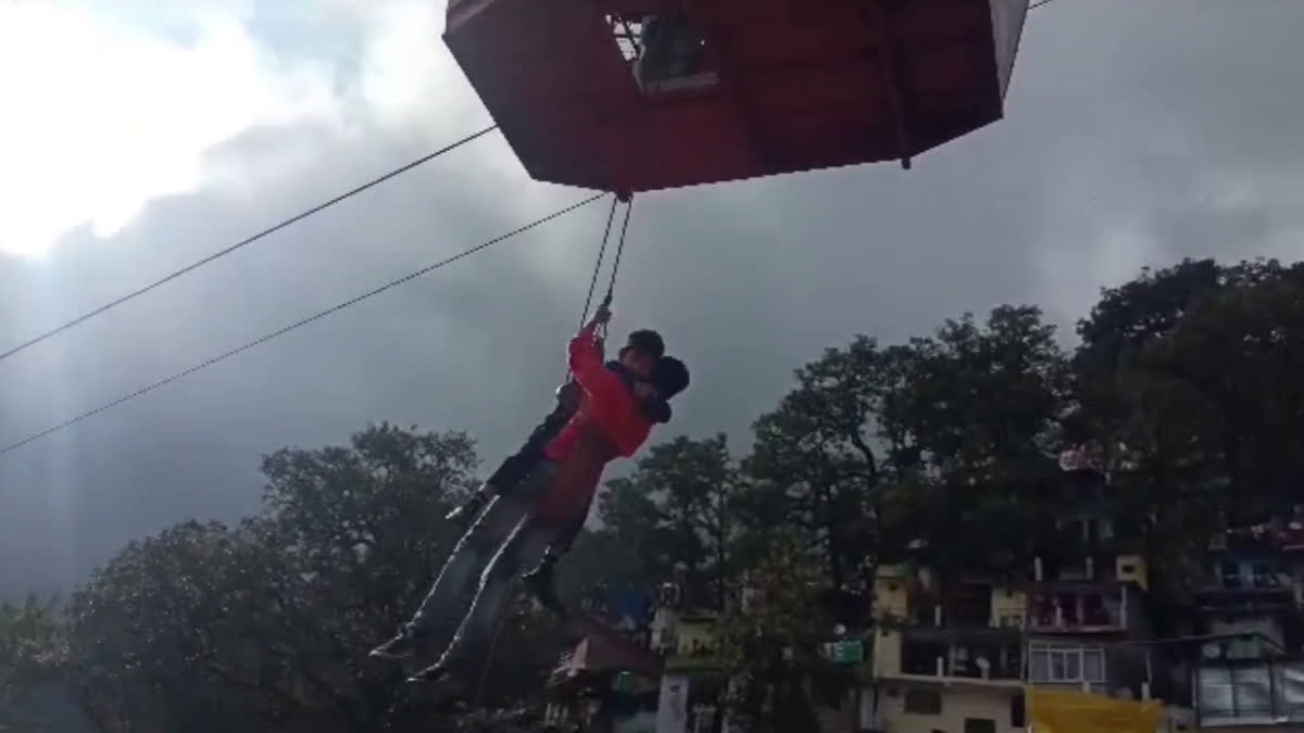 Altogether thirteen people were stuck inside the ropeway trolley box in Uttarakhand's Nainital on Thursday, triggering panic among the tourists. The panic-stricken tourists and school children on board the trolley compartment of the ropeway were hanging in the air for at least an hour.