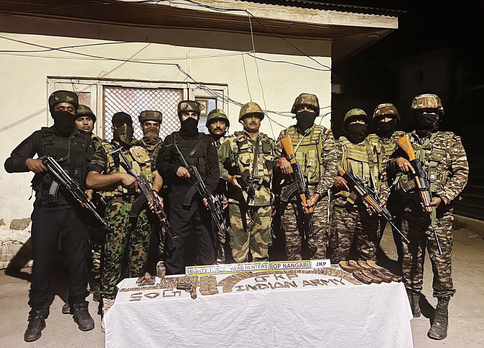 Indian Army and BSF recover arms and ammunition near the Nangari forest in Kupwara on July 2, 2024