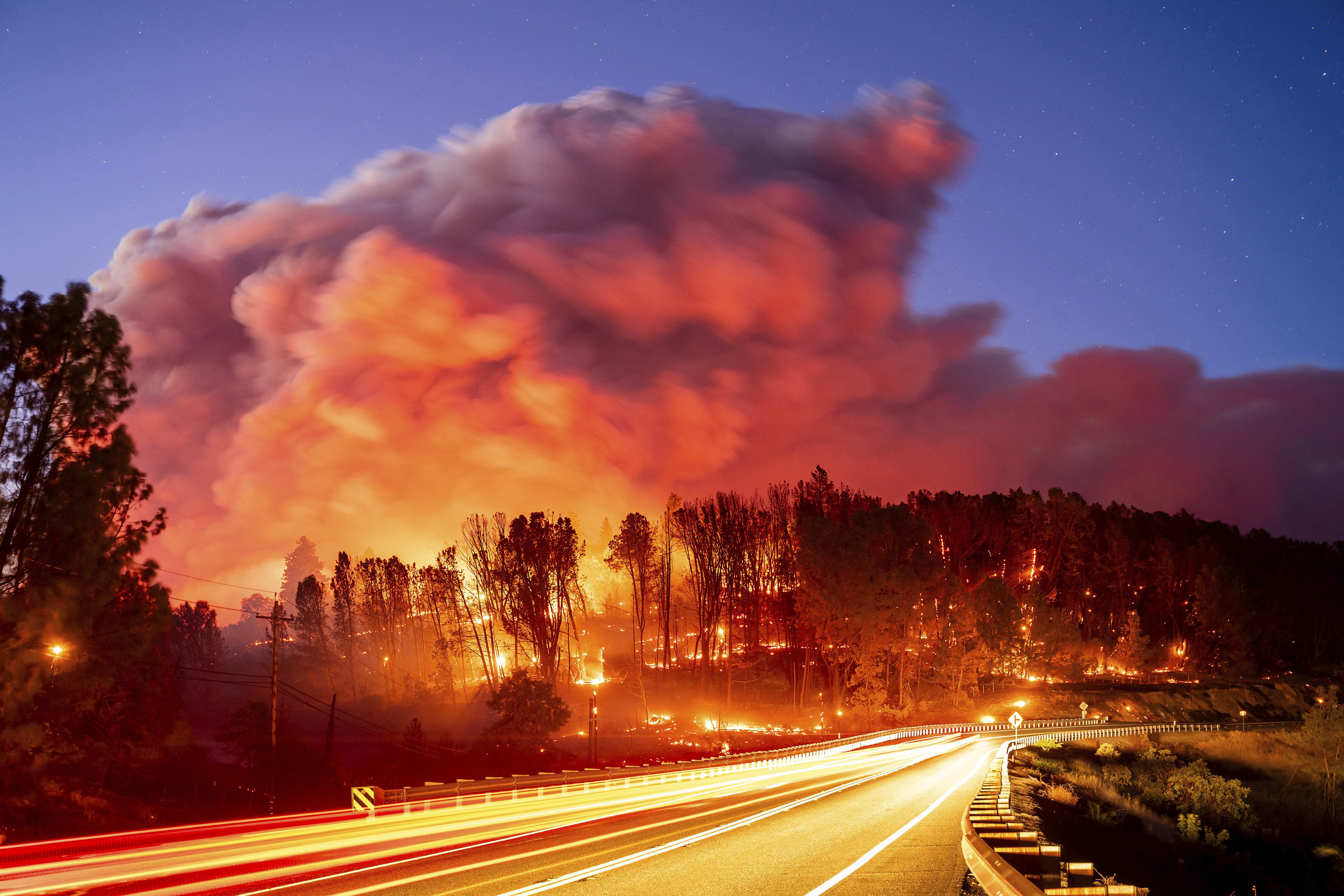 California's largest wildfire explodes in size as fires rage across US West