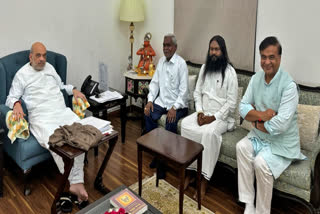 Champai Soren (second from left) at the residence of Union Home Minister Amit Shah in New Delhi on Monday.