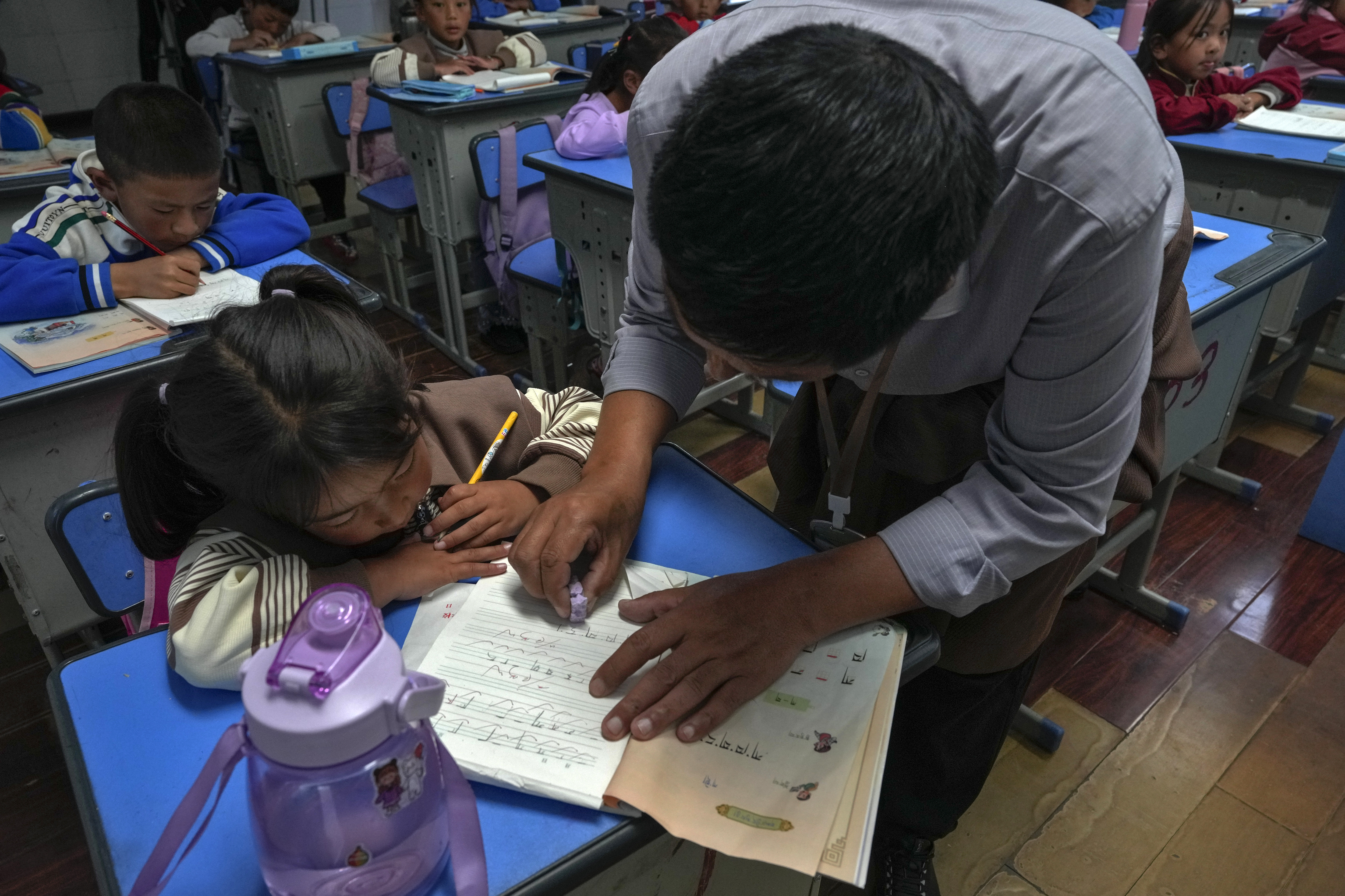 The Shangri-La Key Boarding School offering bilingual education in Chinese-style is seen as a forced assimilation by Tibetan. U.N. human rights experts and representatives from the U.S. and a handful of other Western governments have condemned the system. Human rights campaigns focusing on China's actions in Hong Kong and against the Uyghurs in northwest China's Xinjiang region have hogged the limelight in recent years, but the boarding school issue has helped nudge Tibet back onto the periphery of the international consciousness.