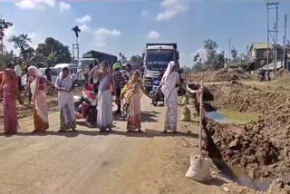 women hold protest at 37 no national highway in sivasagar