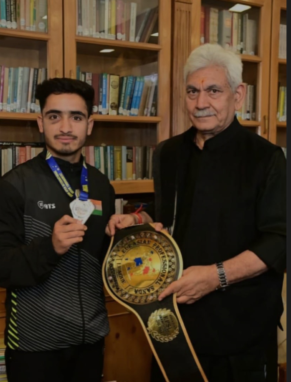 Musharraf Qayoom with LG Manoj Sinha