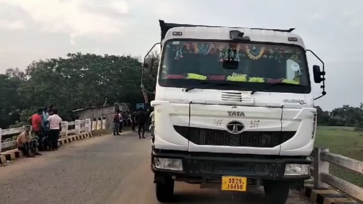 two sand loaded truck seized