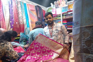 Textile manufacturer Mohammad Tabish with the expensive saree in IITF