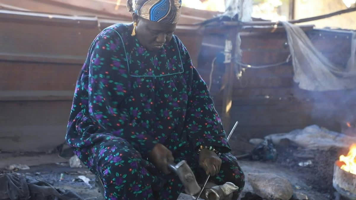 Malian blacksmith Nah, 60, defies taboos, earning dignity through decades of work crafting tools, balancing family responsibilities, and inspiring her community.