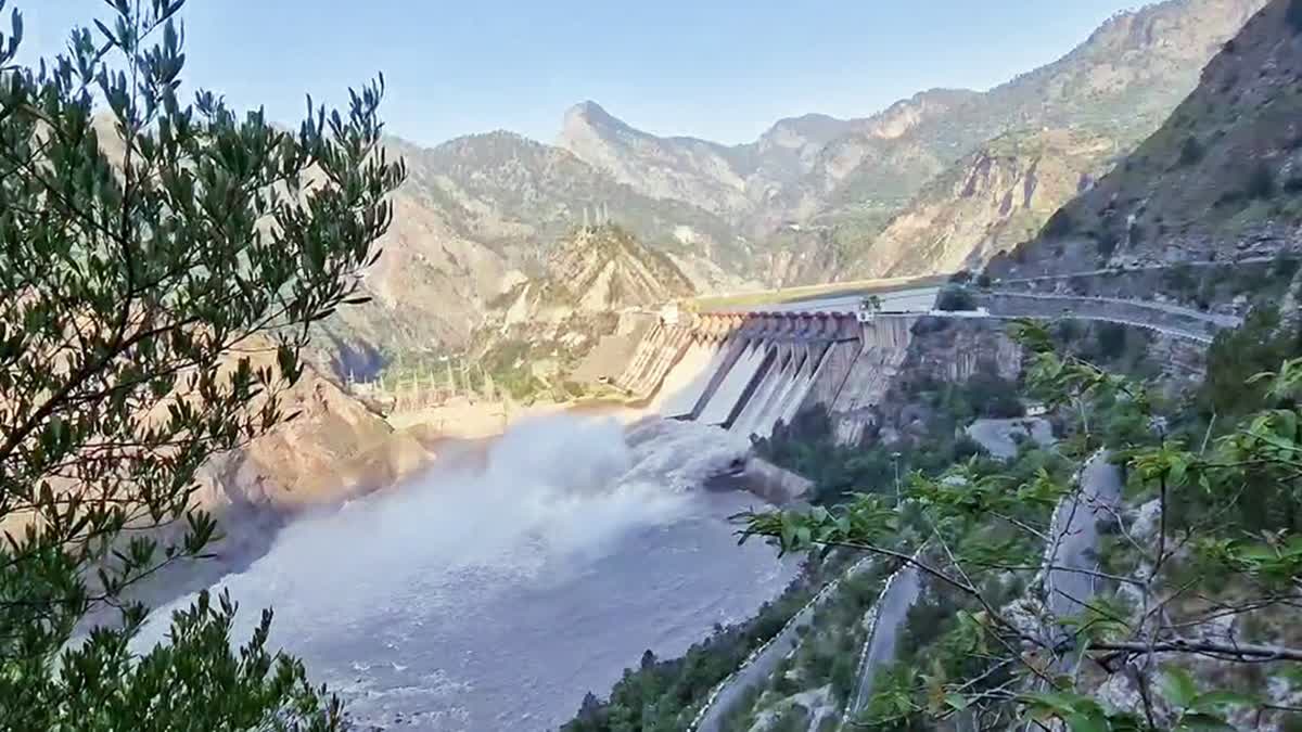 Water gushes out of the Salal Dam after authorities opened its sluice gates due to the rise in the water level of the Chenab River and the deposit of slit in the dam, in Reasi. Chenab valley boasts of many hydropwer projects in Jammu and Kashmir