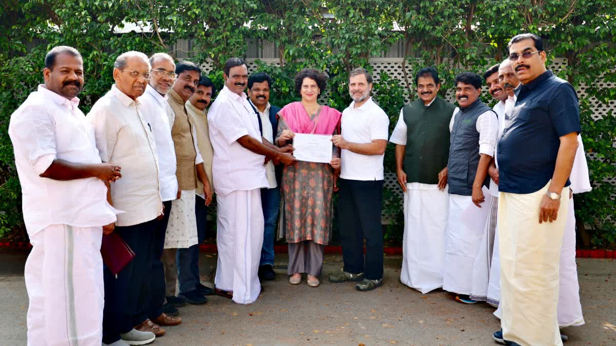 Priyanka Gandhi with Rahul Gandhi and leaders from Wayanad holding certificate of victory in Wayanad Lok Sabha Bypoll