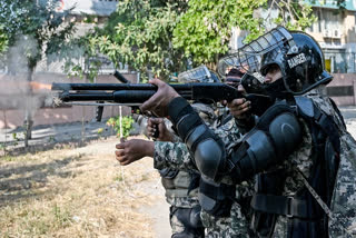 Paramilitary soldiers fire rubber bullets to disperse supporters of the Pakistan Tehreek-e-Insaf (PTI) party during a protest demanding the release of former prime minister Imran Khan, at the Red Zone area in Islamabad on November 26, 2024.