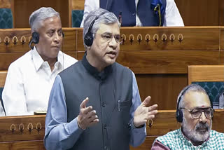 Union Railway Minister Ashwini Vaishnaw speaks in the Lok Sabha during the Winter Session of Parliament, in New Delhi on Wednesday.