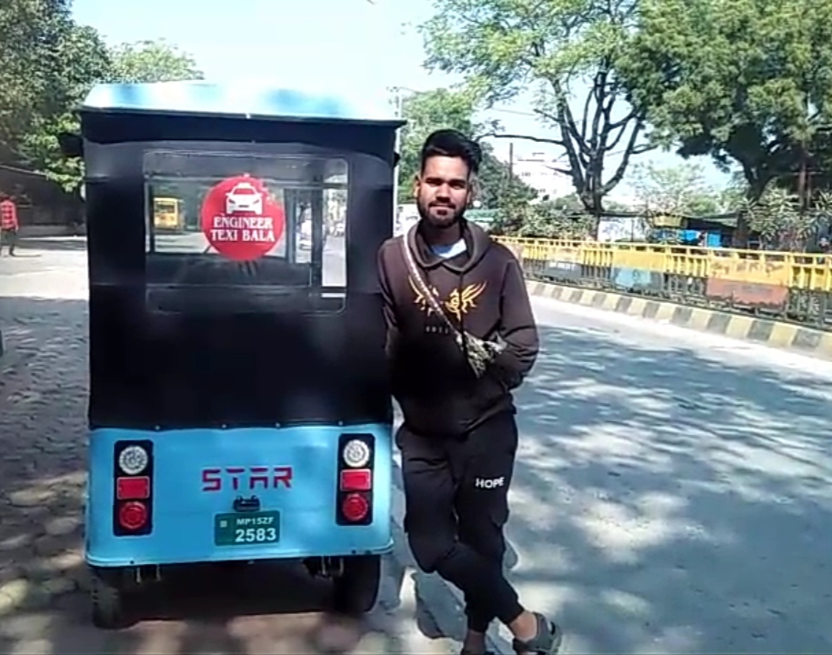 PRASANNA ADARSH DRIVES E RICKSHAW