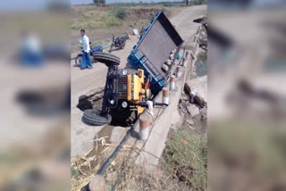 Tractor stuck in ditch after Bridge collapse in Dharawada