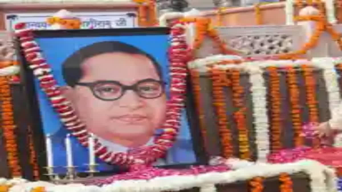 Karnataka boy paraded half-naked holding Ambedkar's portrait.