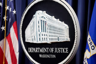 FILE - The logo for the Justice Department