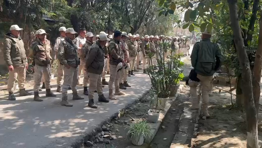 Police and police commando forces protest by surrendering weapons