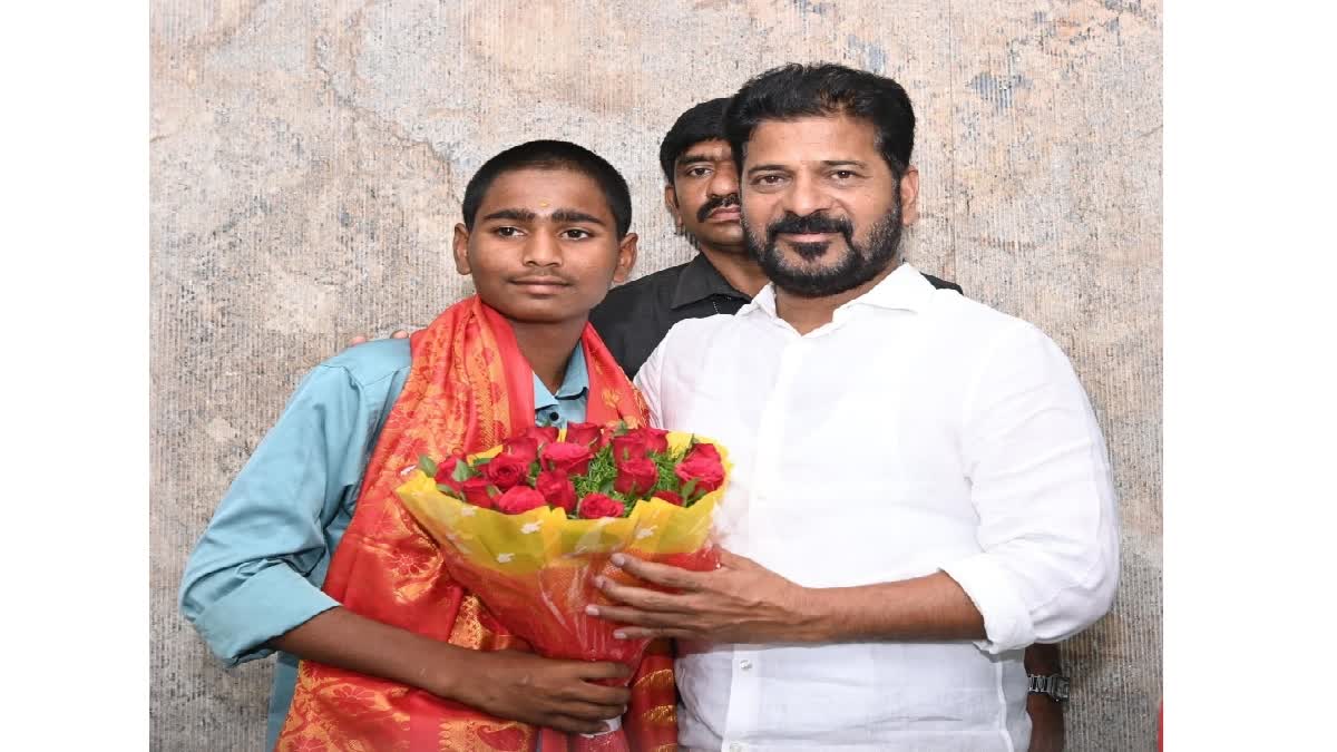 Revanth Reddy Praised boy who saved the fire workers