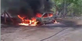 A moving car caught fire near Sector 31 here on Saturday. The driver jumped into the sewer to save himself.