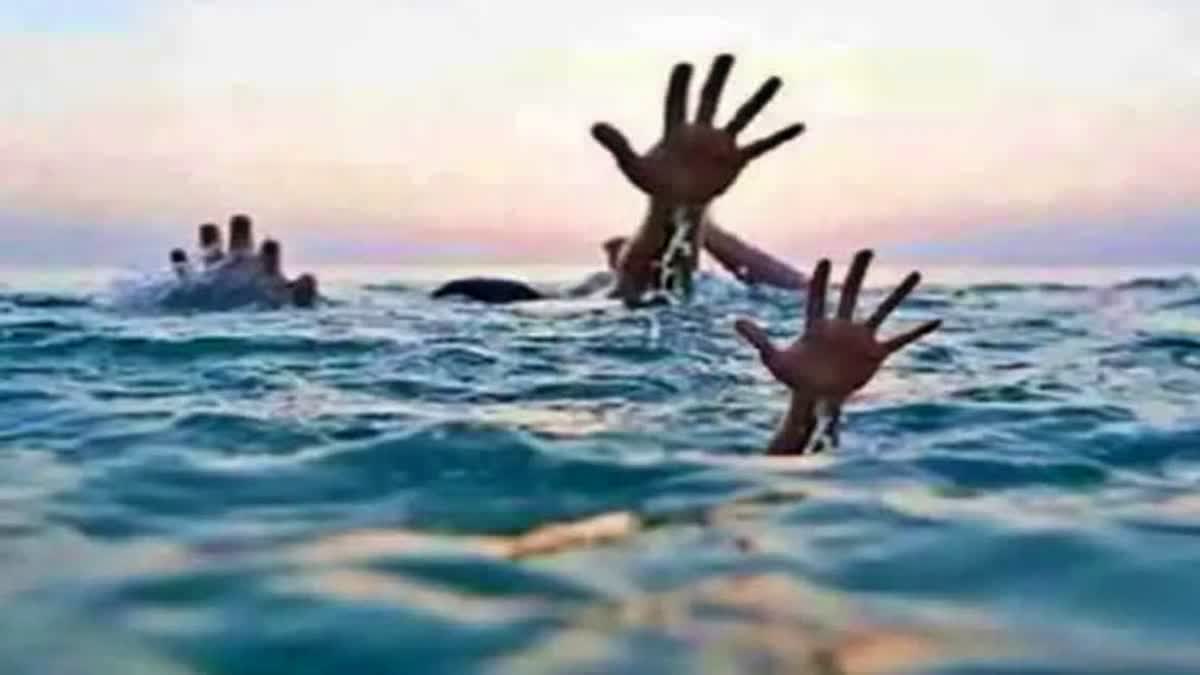 THREE YOUTHS DROWN IN DAM