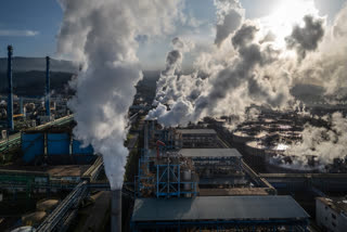 This aerial photo taken on April 18, 2025 shows smoke rising at Weda Bay Industrial Park (WBIP), a major nickel processing and smelting hub, in Lelilef Sawai, Central Halmahera, North Maluku.