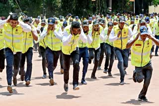 Civil Defence personnel take part in a nationwide 'Civil Defence Mock Drill' codenamed as 'Operation Abhyaas', under the guidelines of Ministry of Home Affairs (MHA), at Ulsoor Fire and Emergency Services in Bengaluru on May 7, 2025. (ANI)
