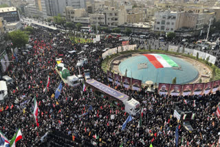 Mourners gather in Islamic Revolution Square (Enghelab Square) to attend the funeral ceremony of the Iranian army generals, nuclear scientists and their family members who were killed in Israeli strikes, during a funeral ceremony in Tehran. Iran