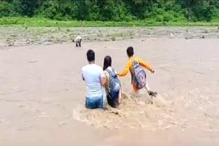 People Cross Sukhi River in Haldwani