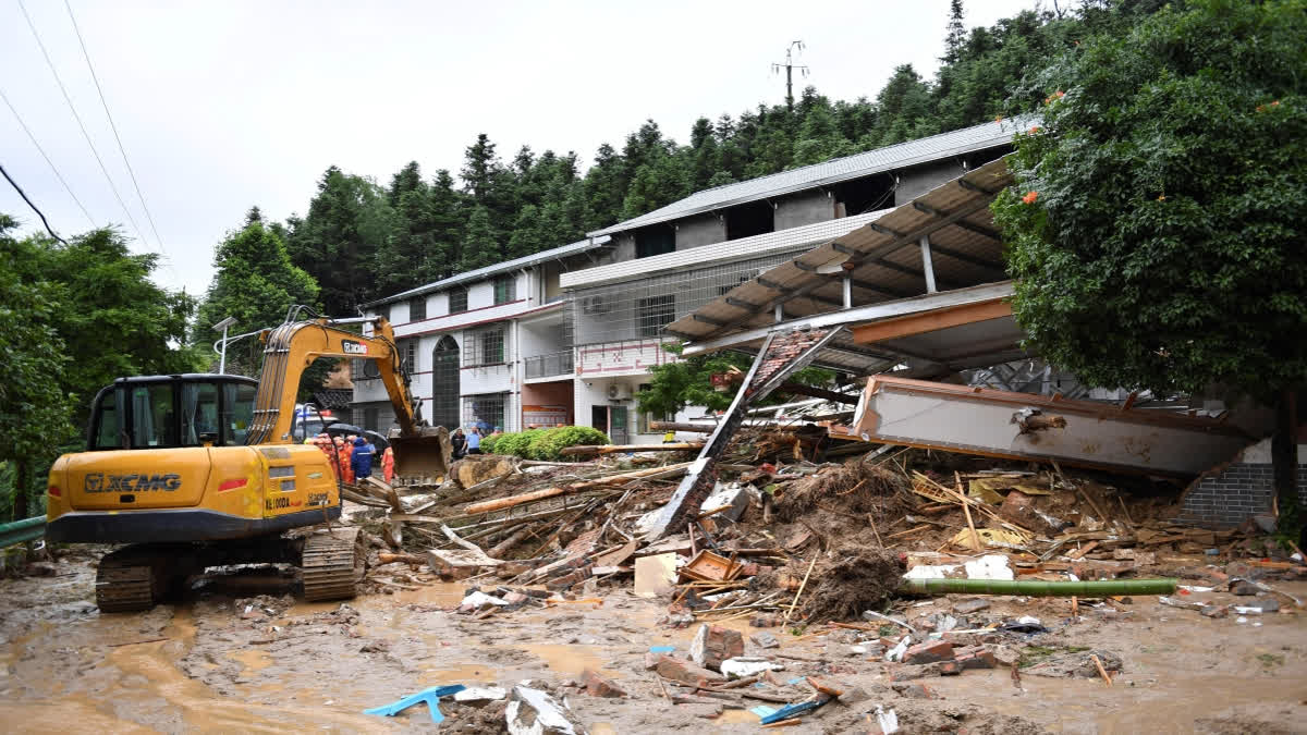 A landslide caused by heavy rains from a tropical storm hit a house in central China's Hunan on Sunday, killing many people and injuring several others.