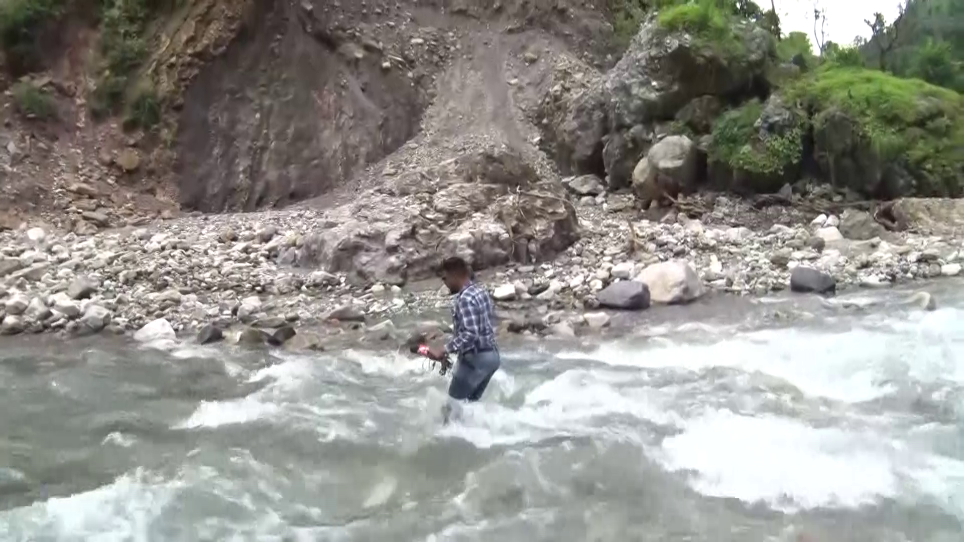 People Crossing River By Trolley in Tehri