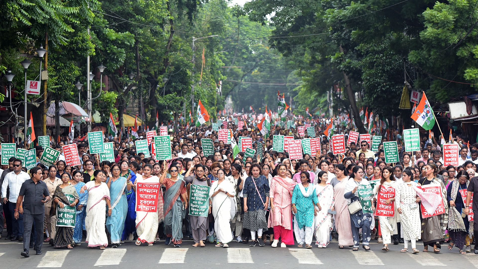 West Bengal CM Mamata Banerjee leading a protest rally in Kolkata.