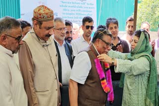 PDP President Mehbooba Mufti (R) welcomes Khurshid Alam after he rejoins party in Srinagar