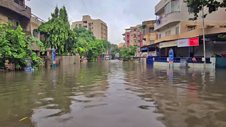 View of an inundated residential area following heavy rainfall in Ahmedabad on Tuesday.