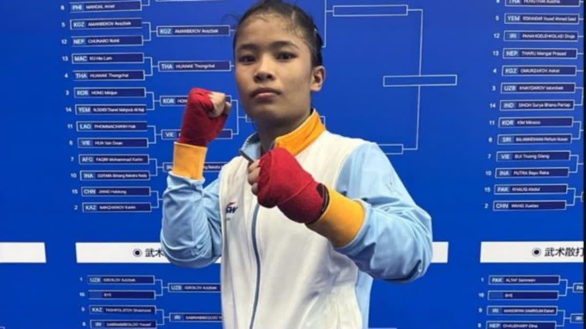 Roshibina Devi  Roshibina Devi Dedicates Medal To Manipur Peoples  Roshibina Devi Wins Silver Medal  Asian Games 2023  Roshibina Devi Wushu  ഹാങ്‌ചോ ഏഷ്യന്‍ ഗെയിംസ്  റോഷിബിന ദേവി വുഷു  റോഷിബിന ദേവി മെഡല്‍  ഏഷ്യന്‍ ഗെയിംസ് വുഷു മത്സരഫലം  മണിപ്പൂരിന് മെഡല്‍ സമര്‍പ്പിച്ച് വുഷു താരം