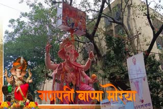 Flowers Showering On Ganesh Idol