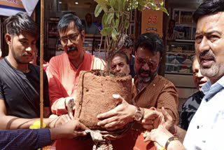 Clay Ganesh Idol immersed in pots