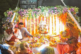Shivraj Singh takes Ganesh idol for immersion