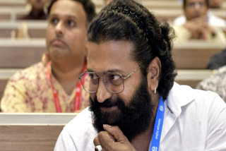 Rishab Shetty sparked controversy with his comments on Bollywood's portrayal of India at international festivals, stating it shows the country in a bad light. At the IIFA Utsavam, Shetty clarified his remarks, promising to provide a detailed explanation in a more suitable setting.