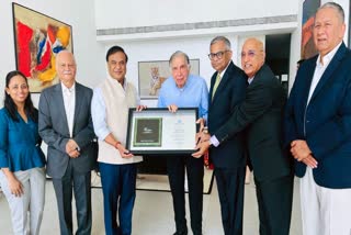 Assam Chief Minister Himanta Biswa Sarma with Ratan Tata and other executives during the signing up of the pact for the semiconductor plant