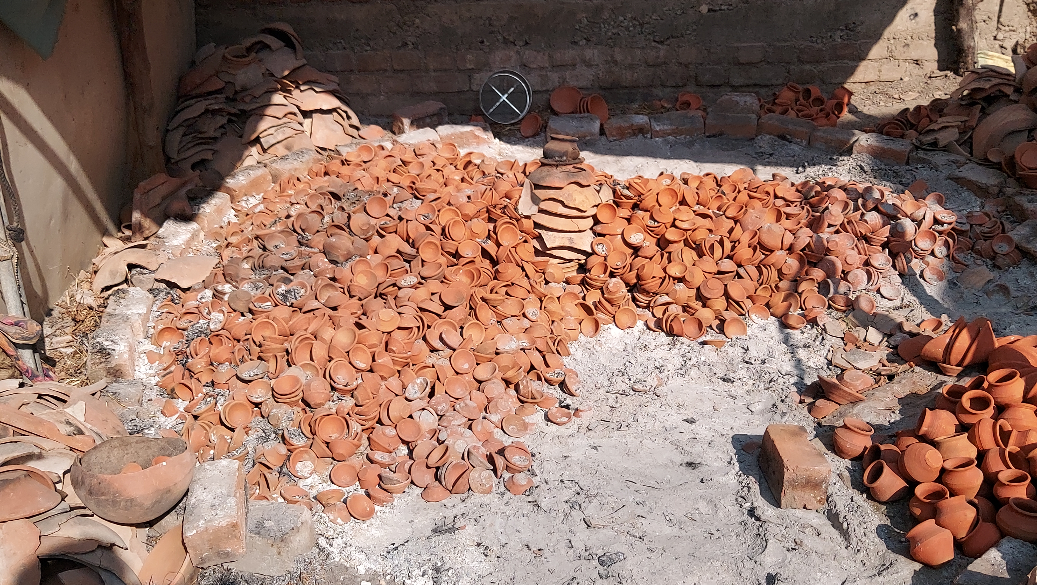 potters making clay diyas