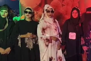 Muslim girls walk ramp wearing burqas