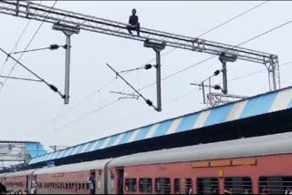 A Man Climbs Electricity Pole in Maharashtra