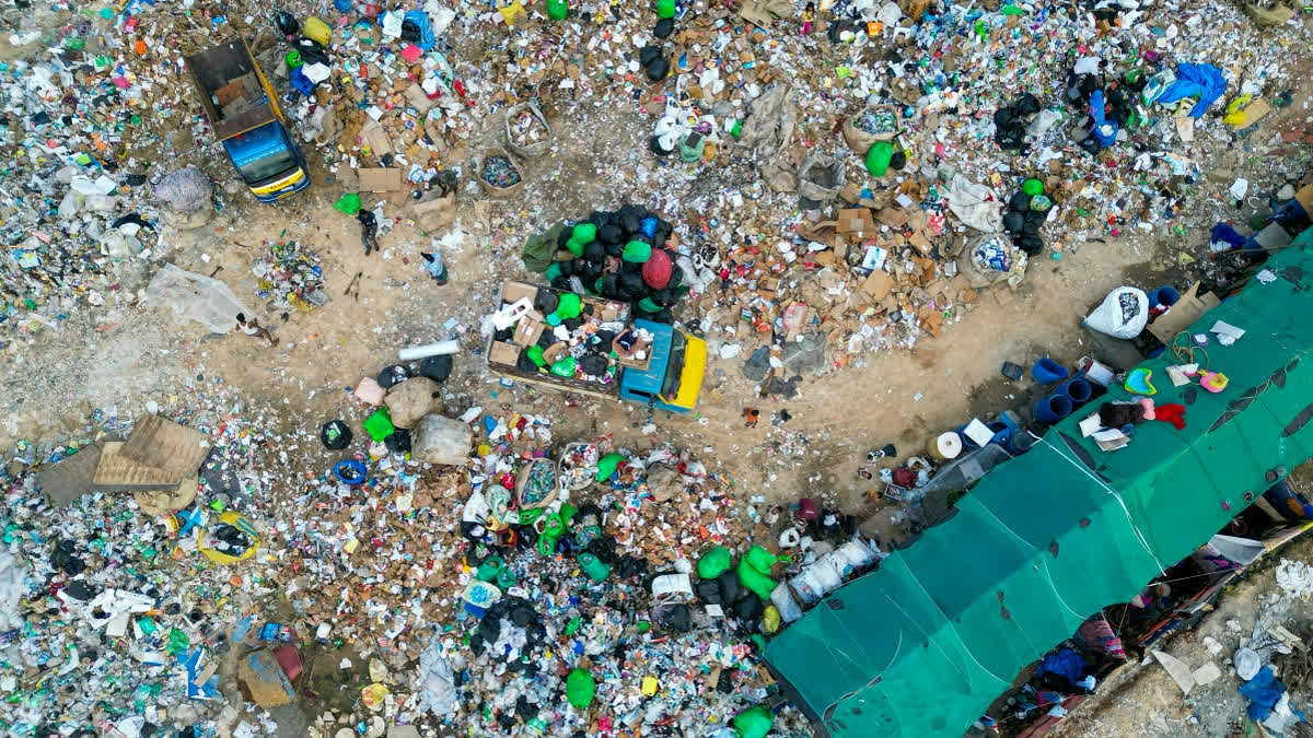 An aerial view shows plastic waste at a landfill on the outskirts of Bengaluru