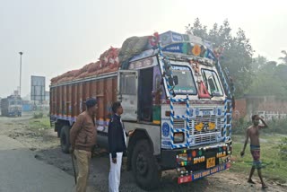 Police stop truck loaded