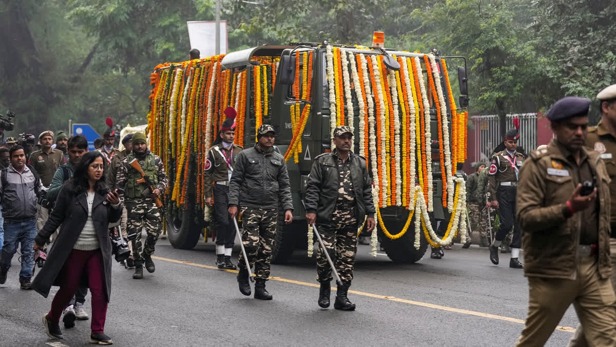 The mortal remains of former prime minister Manmohan Singh being taken to Congress headquarters for party leaders and workers to pay their last respects to him, in New Delhi, Saturday, Dec. 28, 2024.