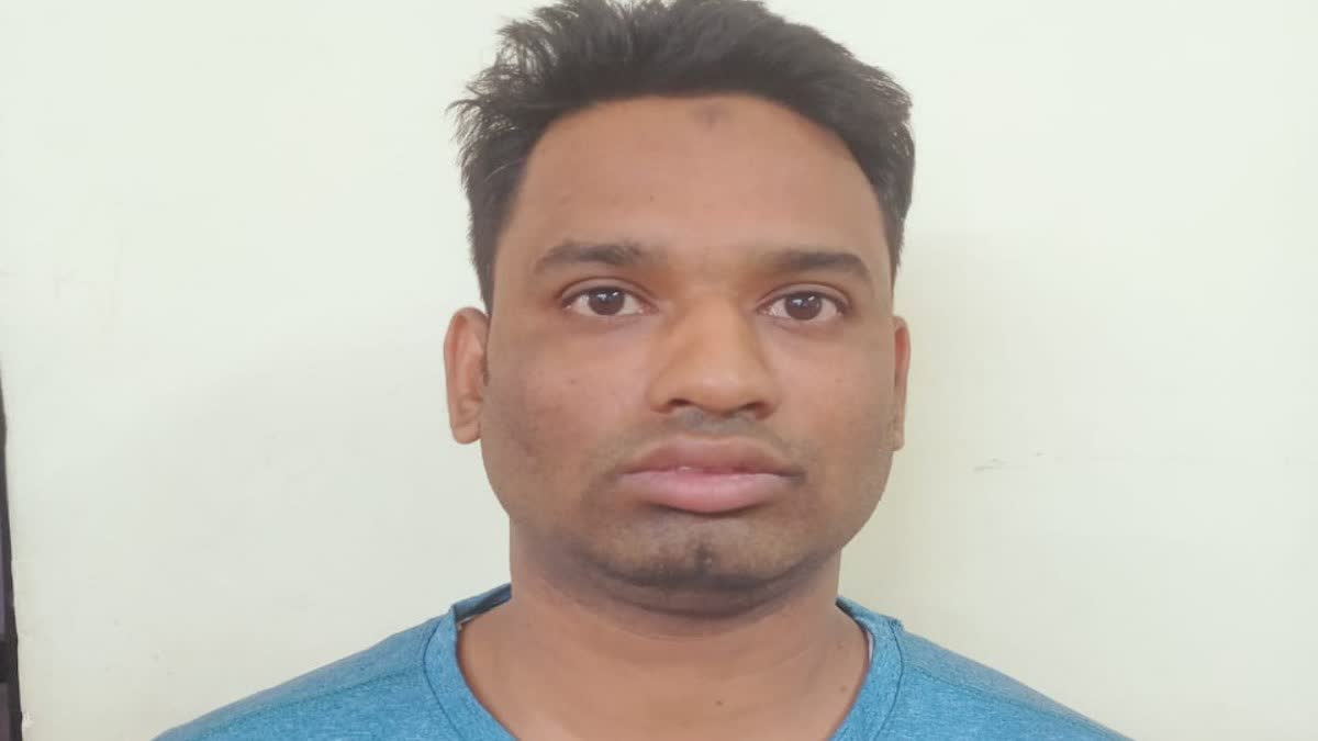 MAN ARRESTED FOR HARASSING WOMAN